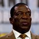 FILE PHOTO: Zimbabwes President Emmerson Mnangagwa attends a meeting of the ZANU-PF central committee in downtown Harare, Zimbabwe, December 14, 2017.